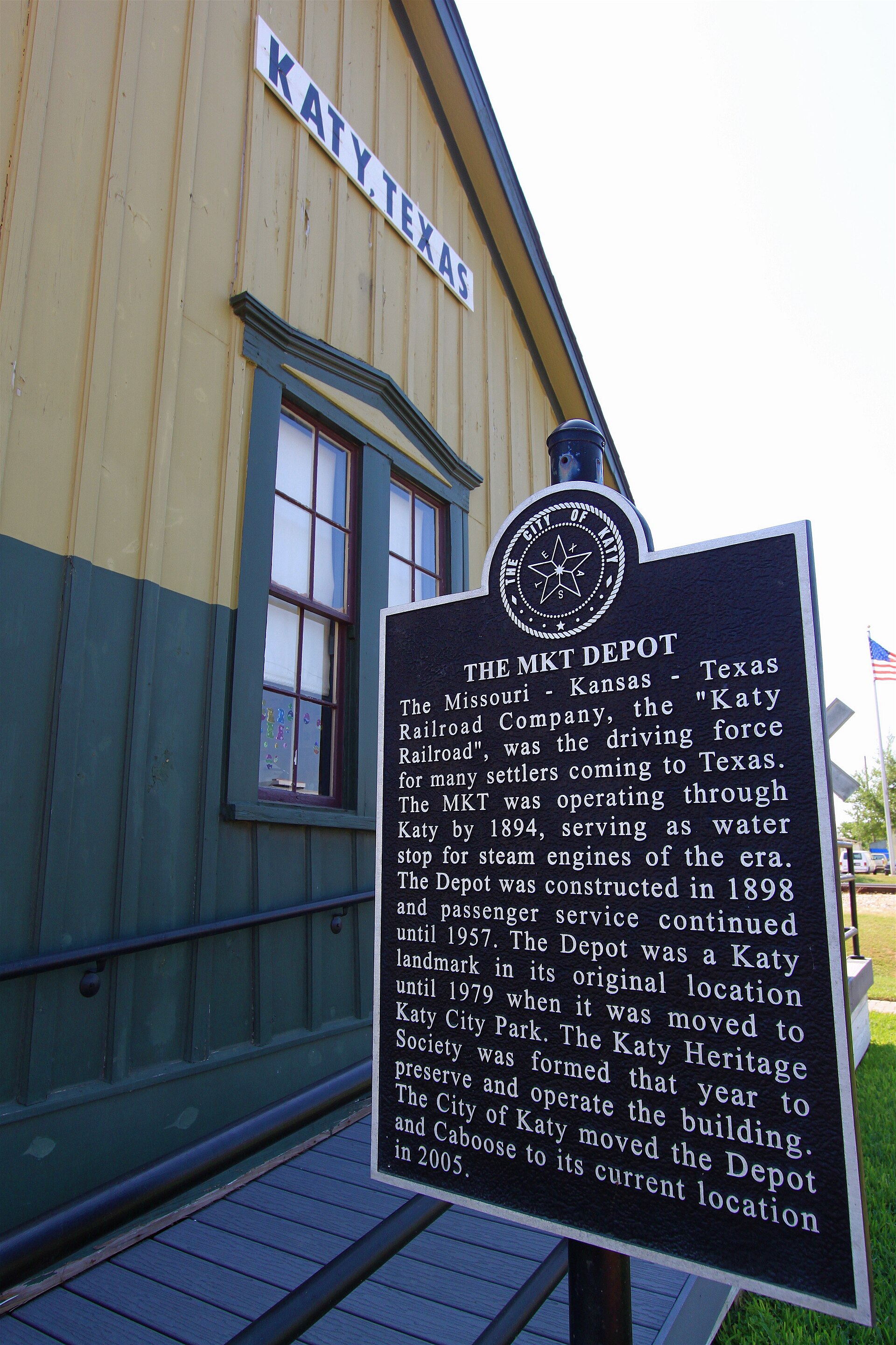 This plaque commemmorates the old M-K-T Railway (a.k.a. 'The Katy').
"The Missouri - Kansas - Texas Railroad Company, the "Katy Railroad", was the driving force for many settlers coming to Texas.  The